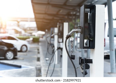 Electric car on electric car charging station. Power supply for electric car charging. Clean energy concept