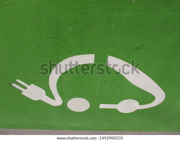 \
Electric car\
plug symbol on the\
street.					