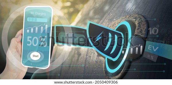 electric cars, EV Car is\
charging a car with a smartphone as a control and display in a\
modern application.