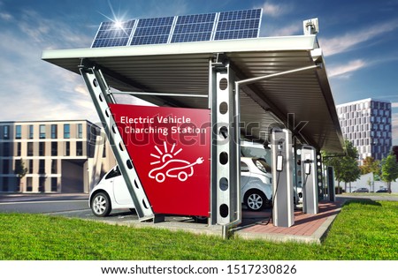 Electric cars on solar Charging Station with solar energy and city buildings