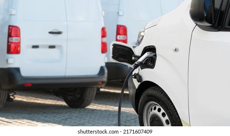 Electric Delivery Van With Connected Charging Cable. 