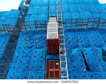 Electric elevator for construction site.
