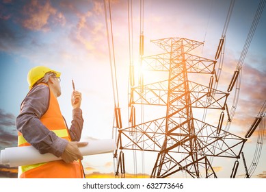 Electric Engineer Inspect The High Voltage Pole