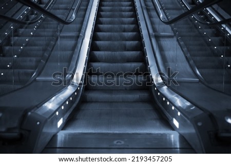 Electric escalator in metro. Moving staircase.