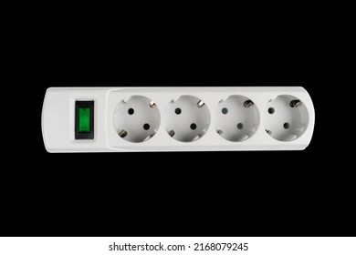 Electric Extender Isolated. The Surge Protector Isolated On Black Background. Closeup Of Electrical Power Strip On Black Background. Power Surge Isolated. Household Surge Protector