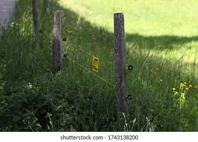 Electric Fencing Around Lovely Pasture With Farm