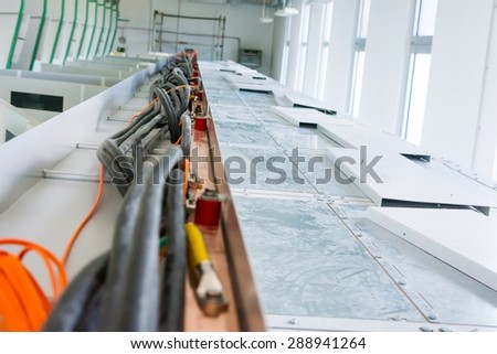 Electric and fiber optic cables. Electric work in progress. 