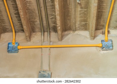 Electric flash- light boxes are installed and connected to power lines, cables and pipes, Wall Building Materials.