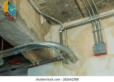Electric flash- light boxes are installed and connected to power lines, cables and pipes, Wall Building Materials.