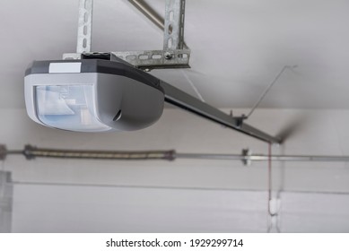 Electric Garage Door Opener Installed In Garage