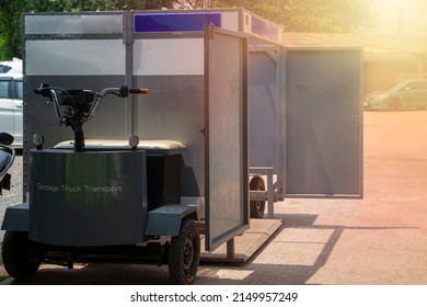 The Electric Garbage Truck  Inside The Hospital Is Used For Transporting Dangerous Infectious Waste Bins.