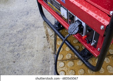 Electric generator, used in the rain on the ground. Fuel motor