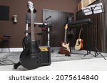 Electric guitar with amplifier at recording studio. Music band practice