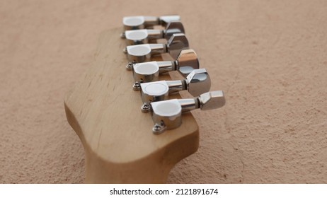 Electric Guitar Headstock Tuning Pegs Close Up