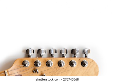 Electric guitar wooden color headstock in horizontal position detail on white background