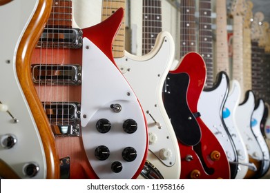 Electric Guitars Hanging On Wall