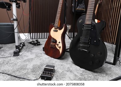 Electric guitars and pedal at recording studio. Music band practice - Powered by Shutterstock