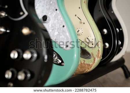Electric guitars shot close up. Music wallpaper