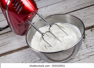 Electric hand mixer with whipped cream 