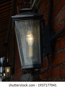 Electric Lantern On A Brick Wall In New York