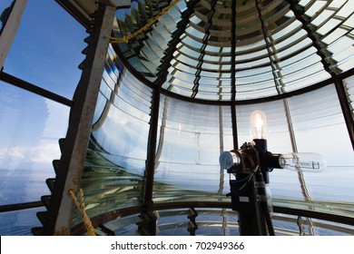 Electric Light Bulb Assembly And Glass Fresnel Lens Of L'anse Amour Lighthouse At Strait Of Belle Isle, Newfoundland/Labrador, NL, Canada