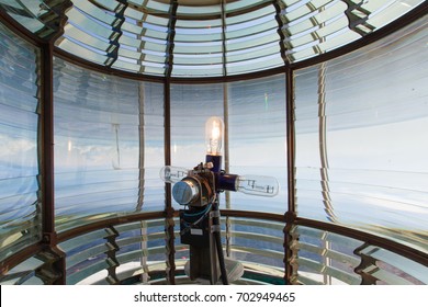 Electric Light Bulb Assembly And Glass Fresnel Lens Of L'anse Amour Lighthouse At Strait Of Belle Isle, Newfoundland/Labrador, NL, Canada