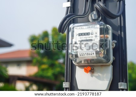 Electric measuring power meter for energy cost at home and office.
