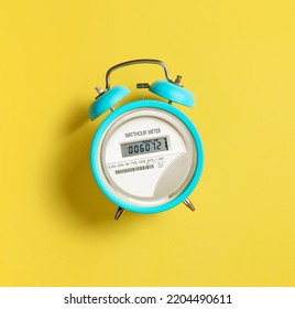 Electric Meter With Alarm Clock. Time To Pay Utility Bills. Increase The Electricity Costs