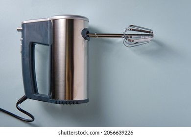 Electric Mixer On A Blue Background, Top View