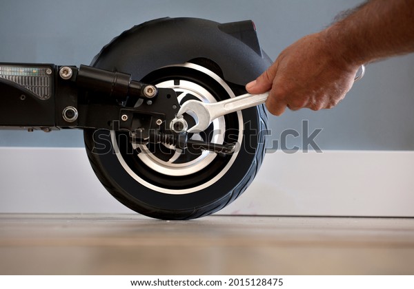 Electric motorcycle maintenance\
service concept. Repair service. Technological\
concept.