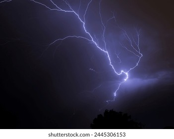 electric natural lightning in the dark night - Powered by Shutterstock