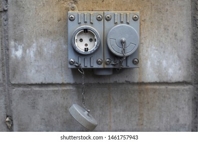 Electric outlet and steel pipe electric wire on concrete wall