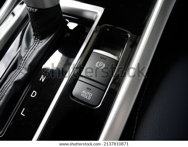 Electric Parking Brake Button and Auto Brake\
Hold Button Next to CVT\
Transmission