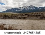Electric Peak Mountain and the Yellowstone River on a cloudy spring day in the Gallatin National Forest