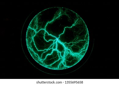 Electric Plasma Ball On Dark Background. Static Electricity Model