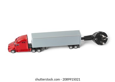Electric plug and toy car truck isolated on white background