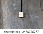 Electric plug in the wall. Furniture industrialist home decoration.