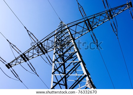 Electric power station with bright sky