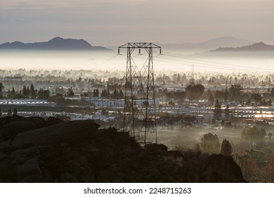 Electric power tower in the foggy Chatsworth neighborhood of Los Angeles California. - Shutterstock ID 2248715263