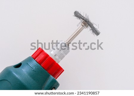 Electric rotary tool and its equipment steel wire brush  isolated in white background