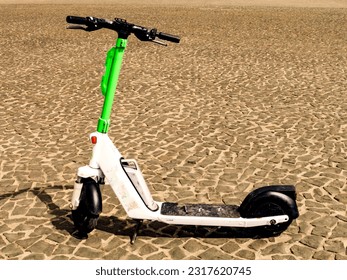 An electric scooter, an eco-friendly transportation option, Lime Electric Scooter, parked, an E-scooters used for urban transportation