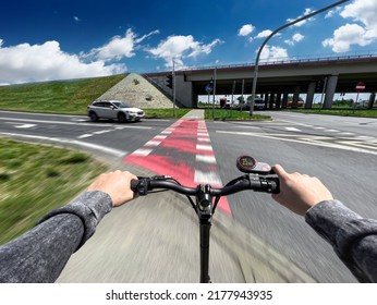Electric scooter fast ride through bike pathway in the city - first-person view photo - Shutterstock ID 2177943935