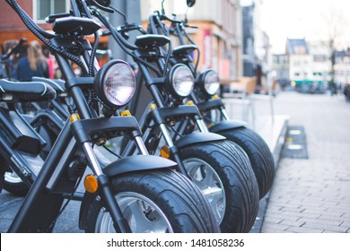 Electric scooters, E-bikes, and motorcycles in the city waiting to get picked bij a costumer