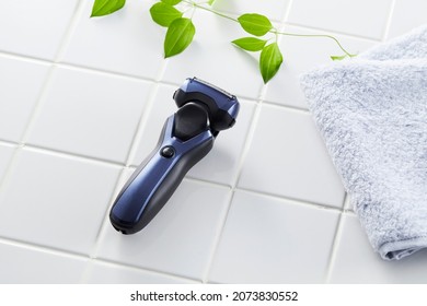 Electric shaver, morning shaving, giving off a sense of cleanliness - Shutterstock ID 2073830552