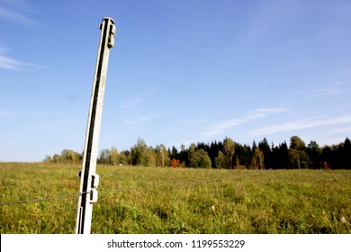 Electric Shepherd Wire In A Meadow