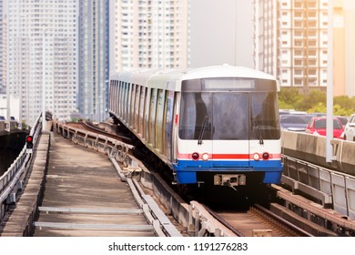 Electric Skytrain Is Running In Downtown Of Bangkok Metropolitan Region. It Is Running On Railroad Tracks.