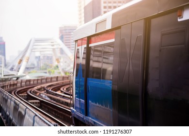 Electric Skytrain Is Running In Downtown Of Bangkok Metropolitan Region. It Is Running On Railroad Tracks.