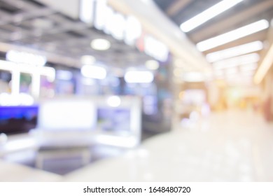 Electric Store In Shopping Mall Blur Background.