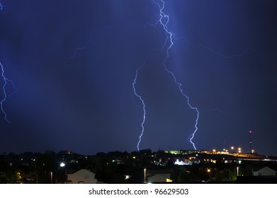 Electric Storm Above The City. Night Stormy Sky. Severe Weather Photo Collection.