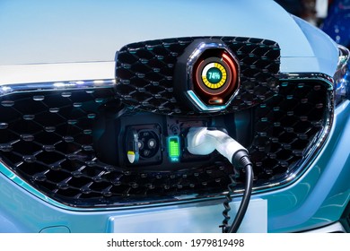 Electric SUV car charging with graphical user interface, Future technology EV car concept